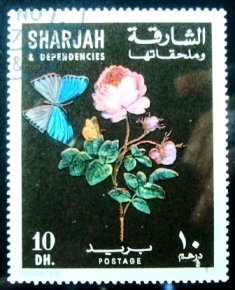 1967 - Hybrid tea rose and blue-gray butterfly